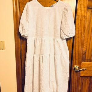 Mid length white dress